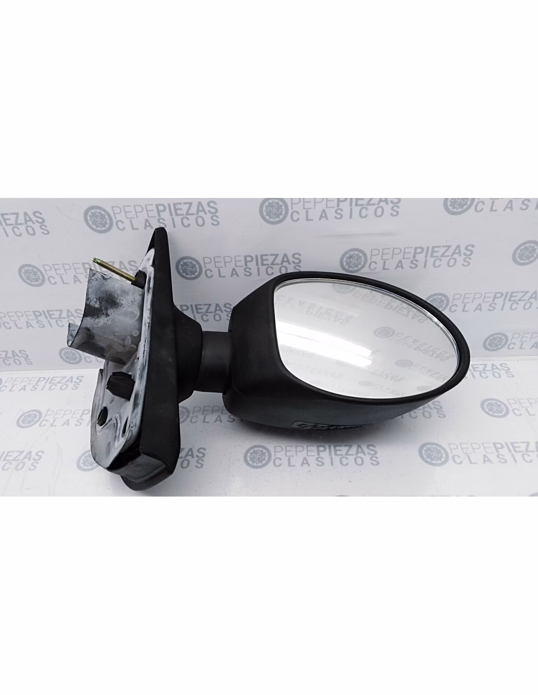 ¿Cómo se llama el espejo que se baja en el carro?